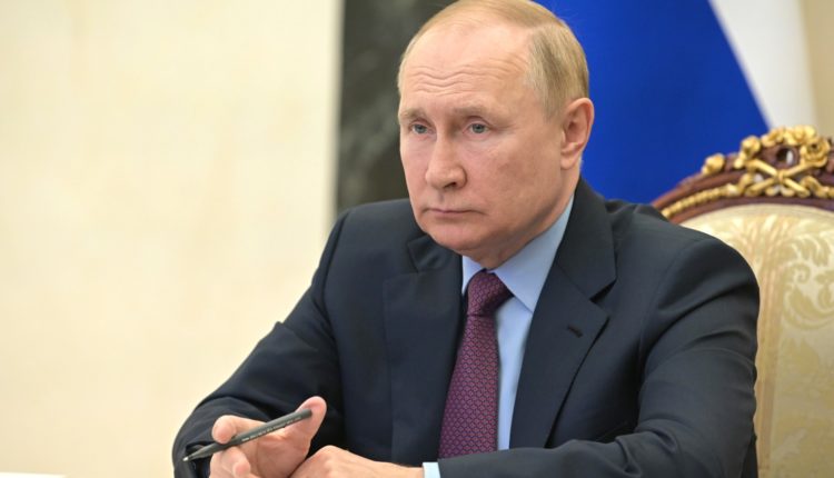 Путин