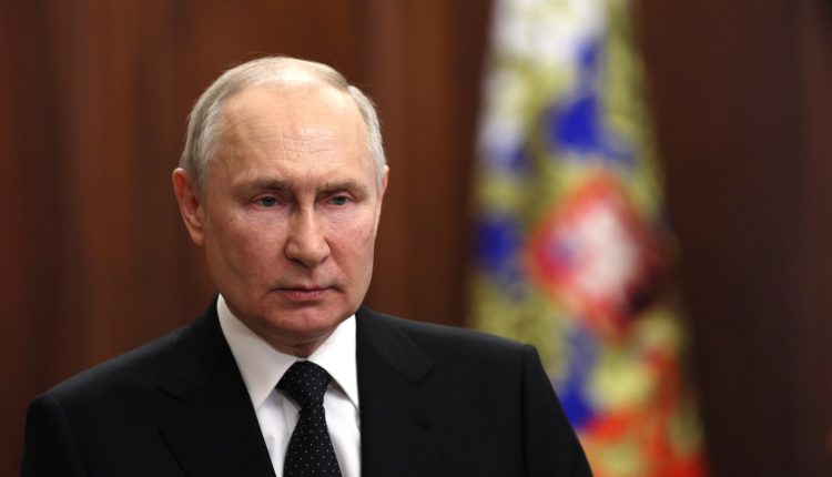 Путин