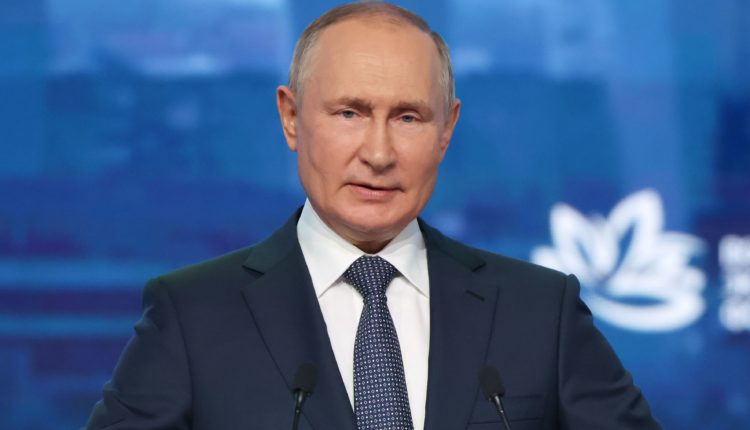 Путин